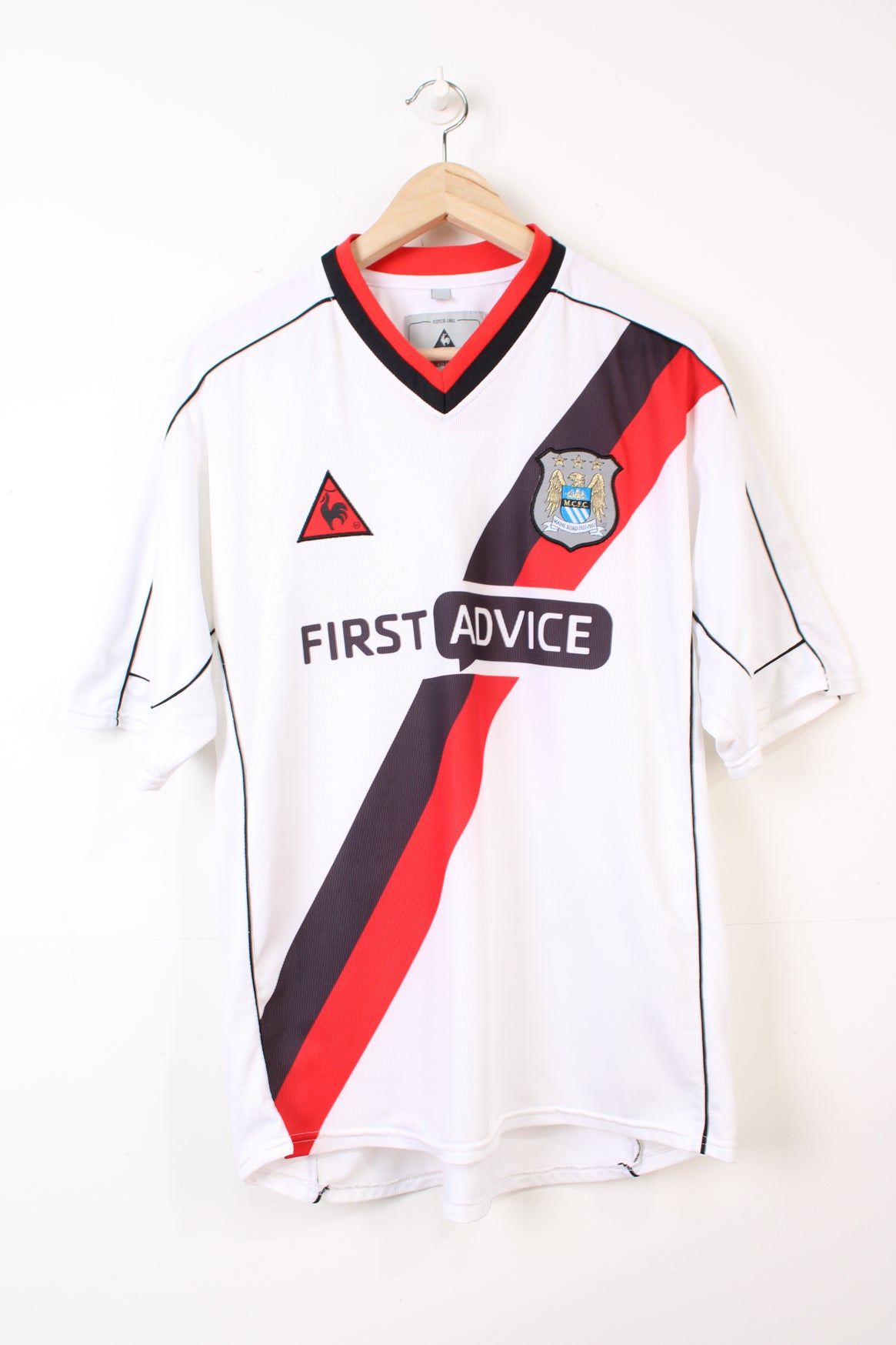 Man city first advice shirt online