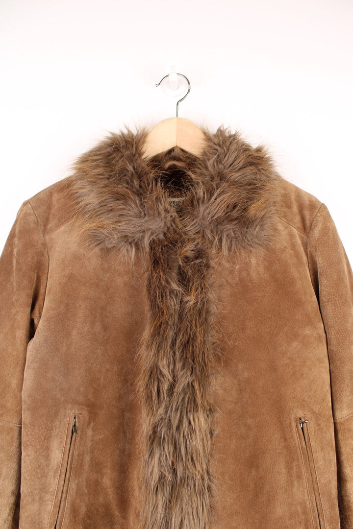 Y2K short brown afghan coat by Yessica with faux fur trim, two zipped pockets, and hook and eye closure.