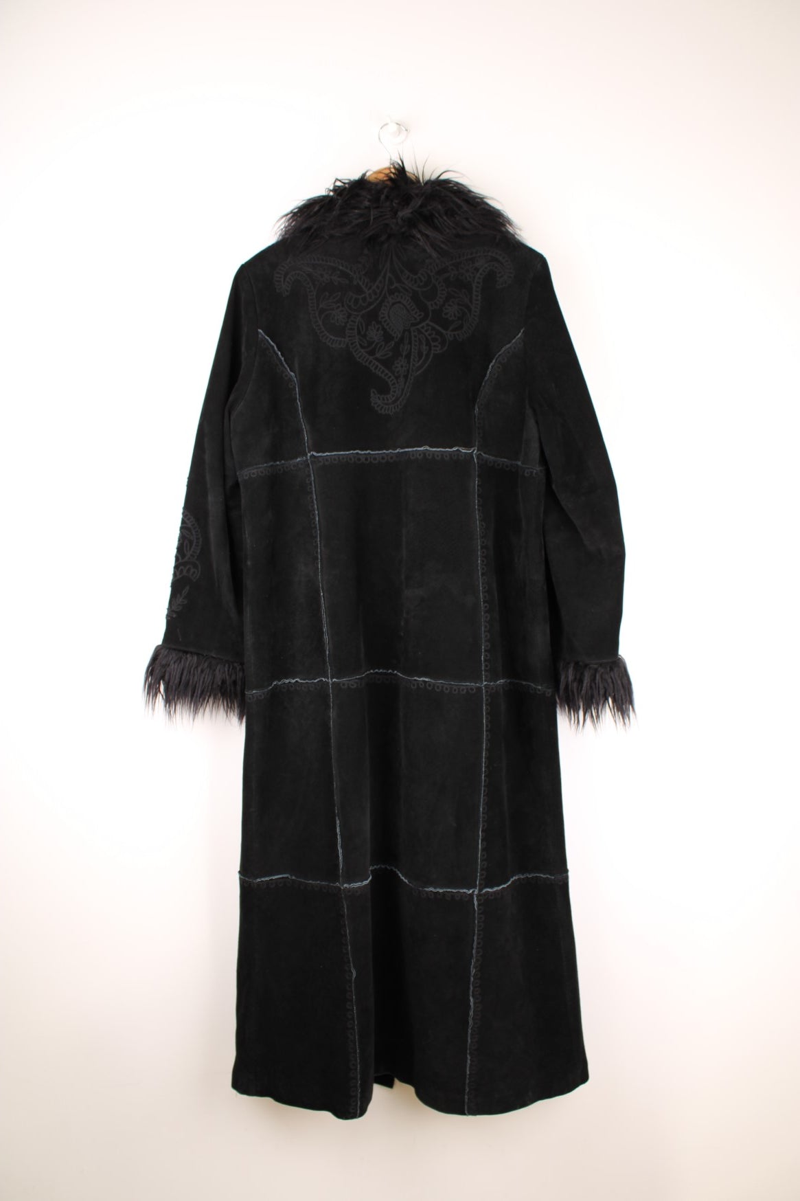 Y2K black suede afghan coat by Bernardo, with faux fur trim, embroidery on the back and sleeves, two side pockets, and hook and eye closure.  