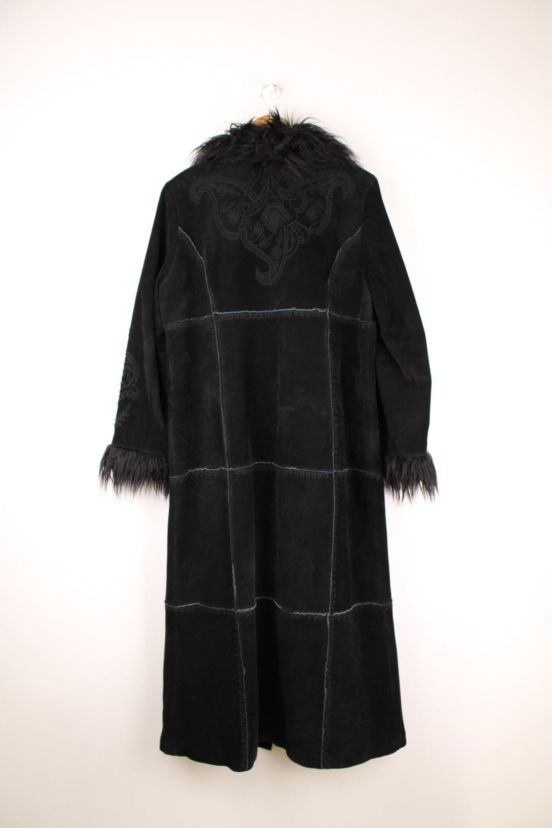 Y2K black suede afghan coat by Bernardo, with faux fur trim, embroidery on the back and sleeves, two side pockets, and hook and eye closure.  