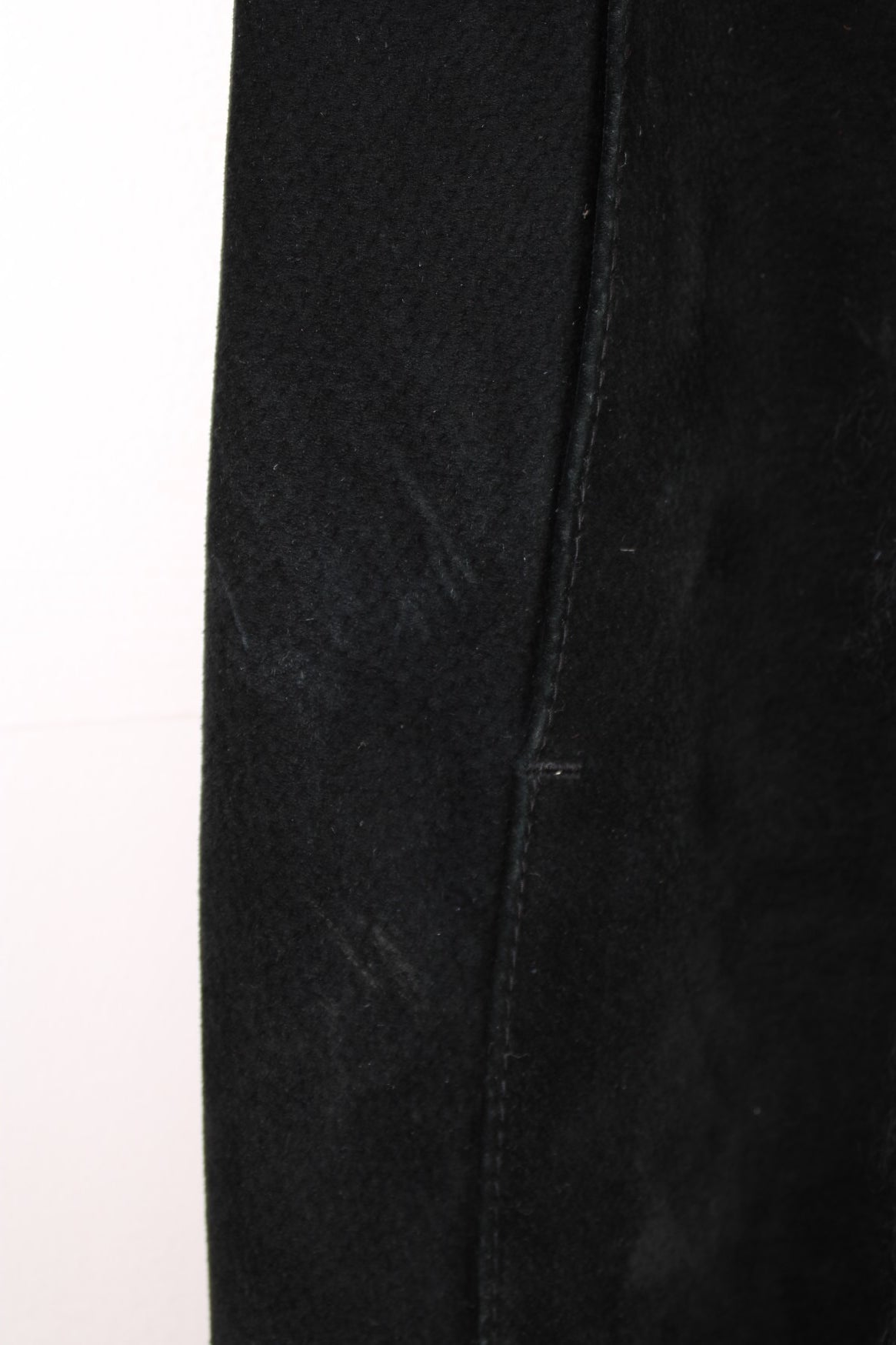 Y2K Topshop afghan coat in black suede with faux fur trim, two side pockets, and hook and eye closure. 