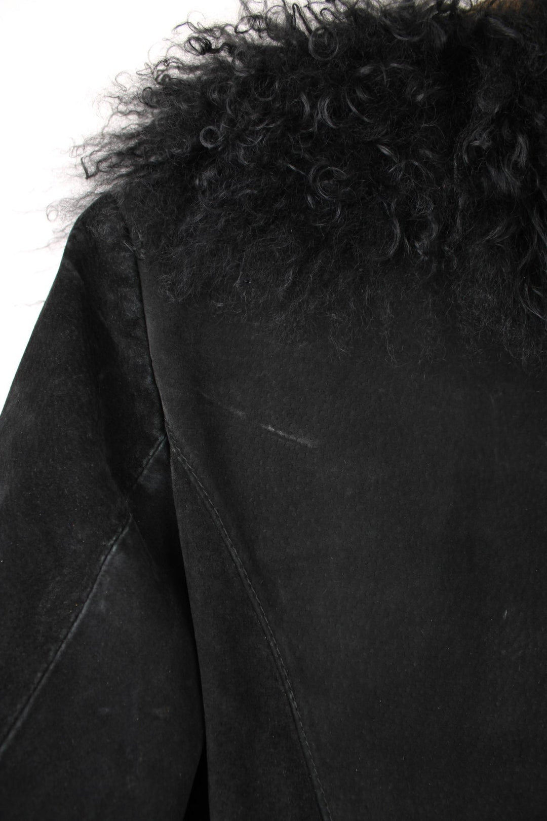 Y2K Topshop afghan coat in black suede with faux fur trim, two side pockets, and hook and eye closure. 