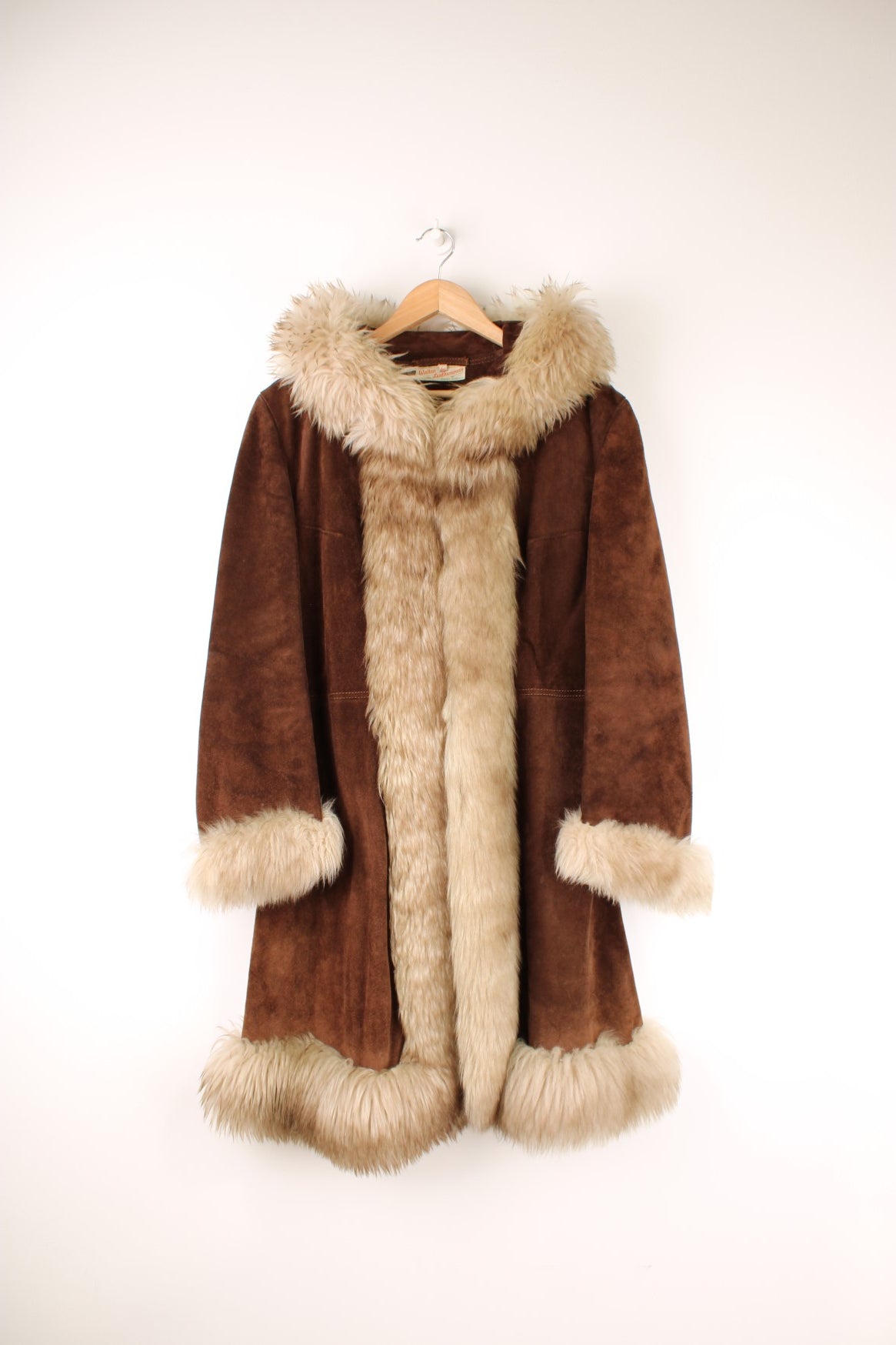 Vintage Walton Leather brown suede afghan coat with white trim and a hood. 