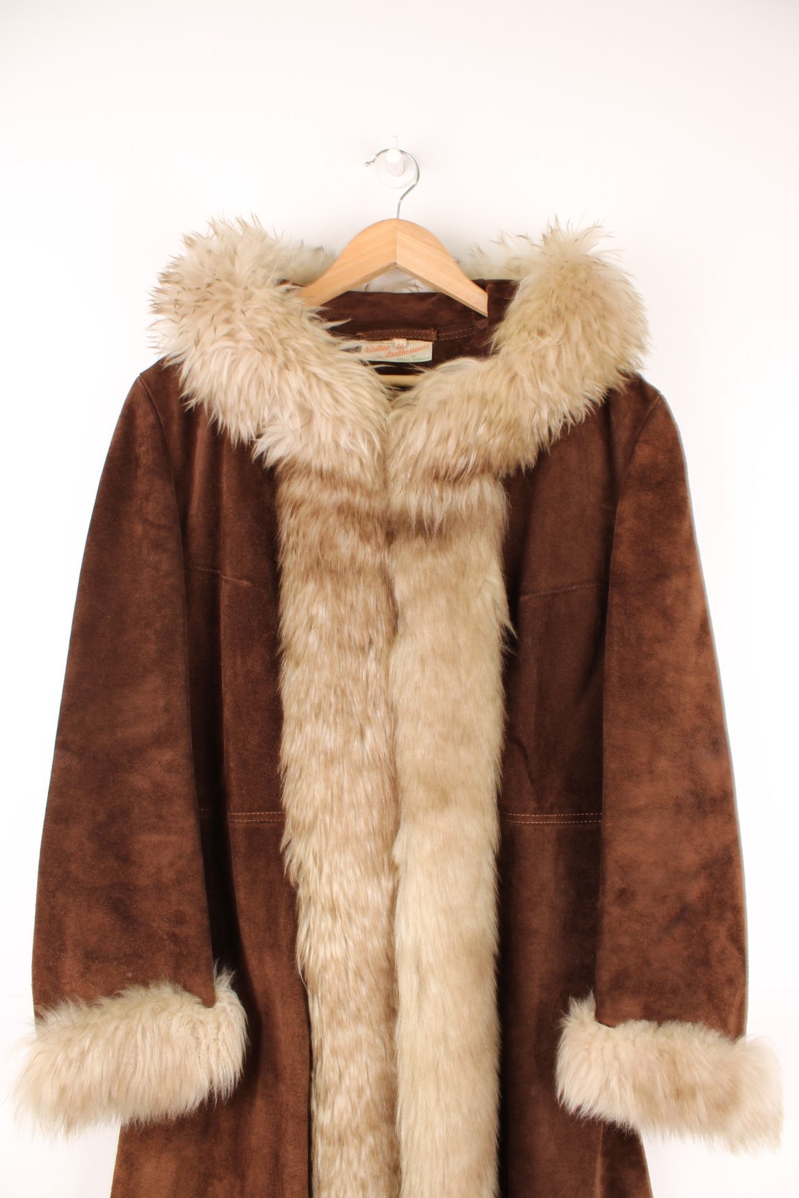 Vintage Walton Leather brown suede afghan coat with white trim and a hood. 