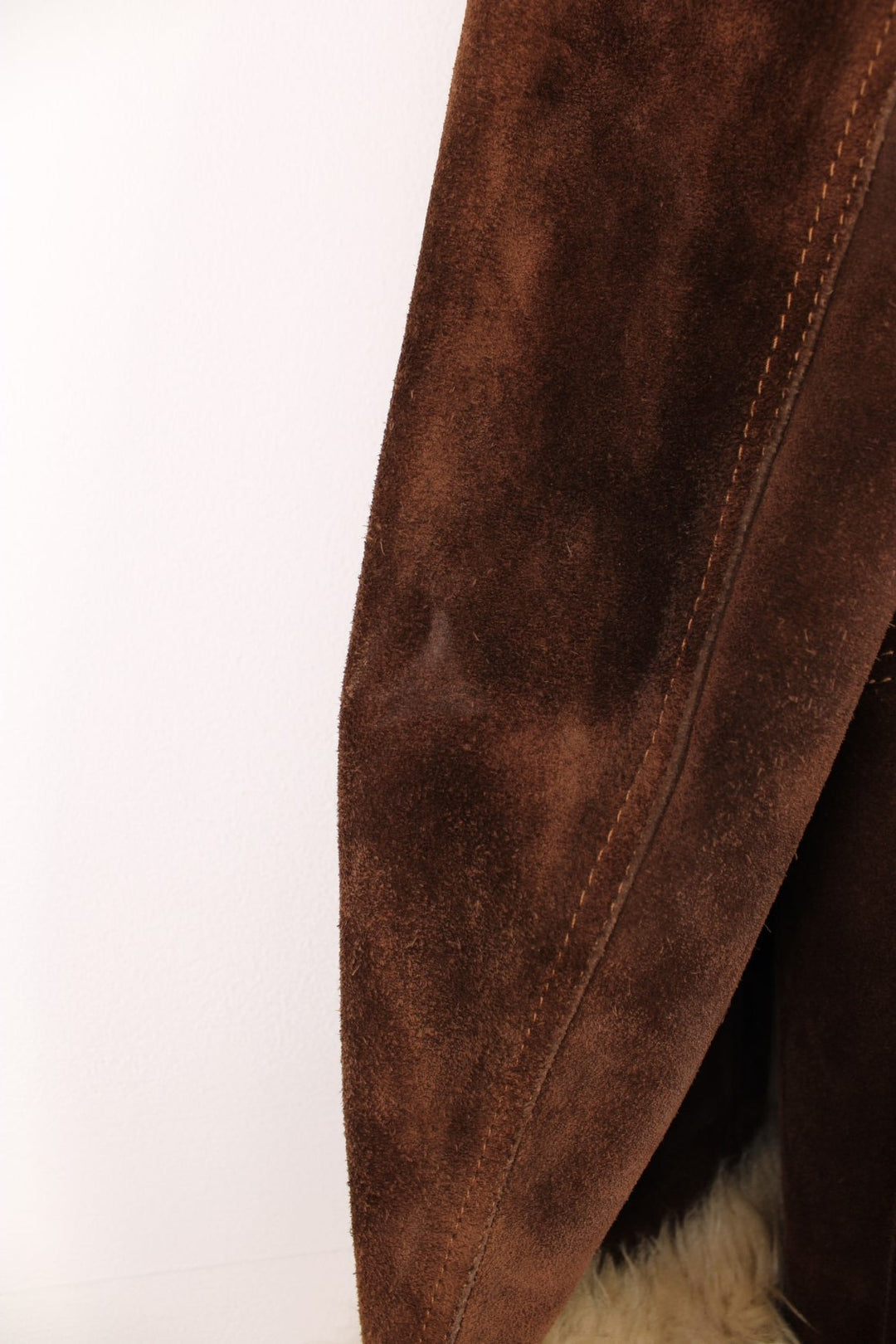 Vintage Walton Leather brown suede afghan coat with white trim and a hood. 