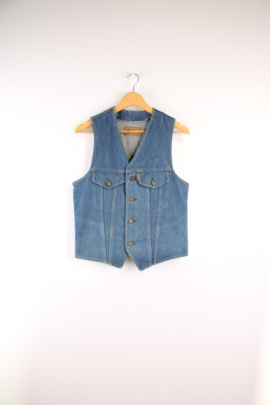 Levi Strauss 1970s Orange Tab waistcoat in a mid blue colourway, The waistcoat has two small breast pockets and it has a slim fitted silhouette. 