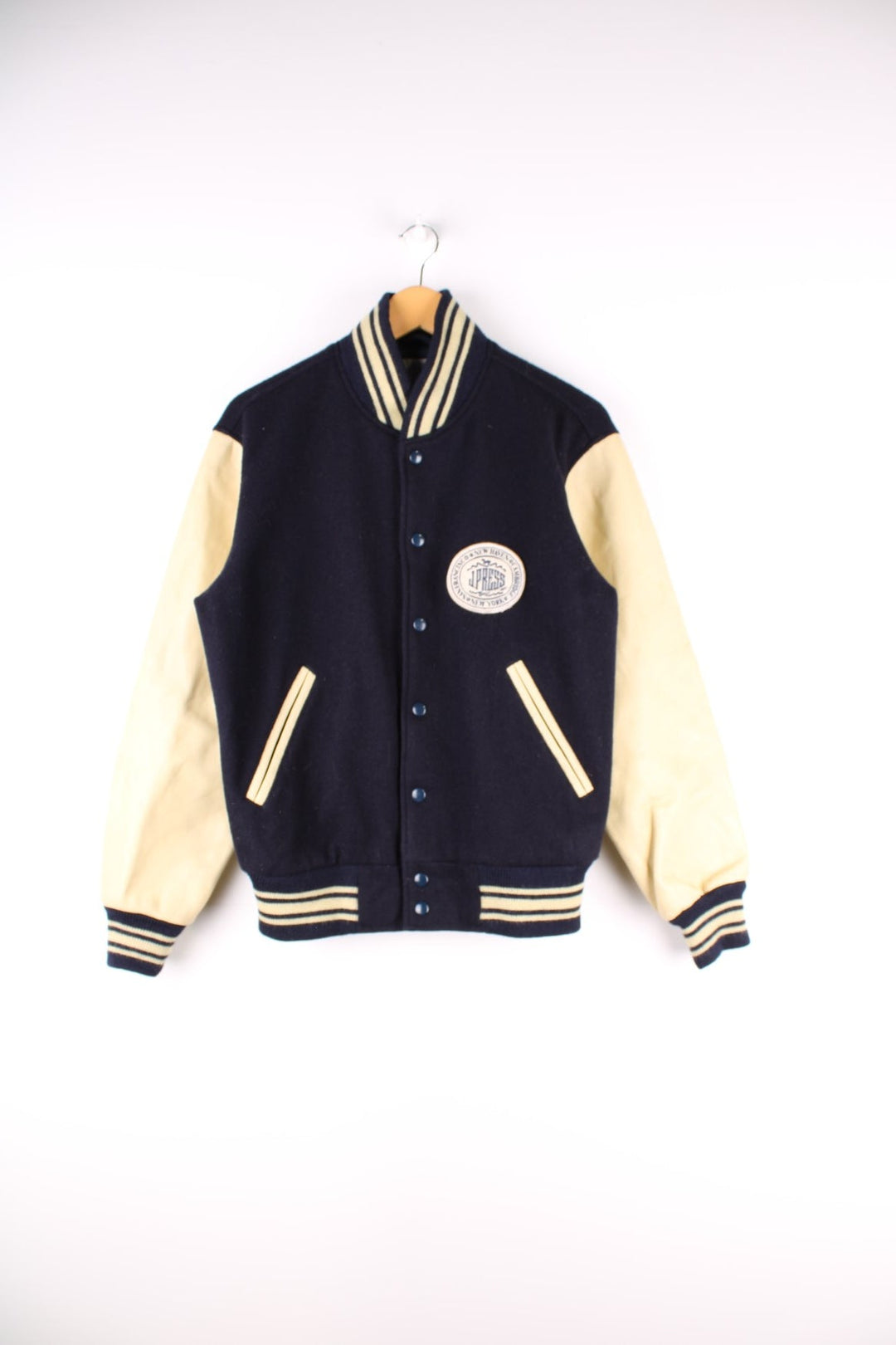 Vintage J Press Varsity Jacket in navy blue with cream sleeves and detail, The jacket has two jetted pockets, a J Press Patch on the front and elasticated cuffs.