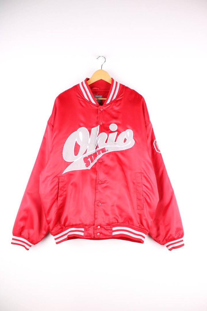 Vintage Ohio State baseball jacket in a red satin colourway. The jacket has the classic elasticated cuffs and collar, two pockets on the front panels and a large Ohio State logo across the chest. There is also a small embroidered patch on the arm.  