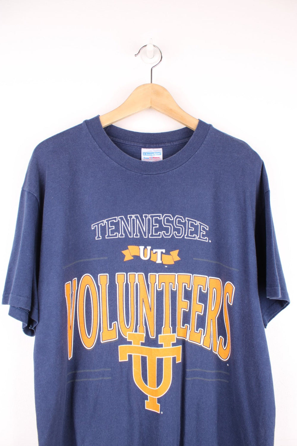 Tennessee University Volunteers tee in navy blue with yellow text. 