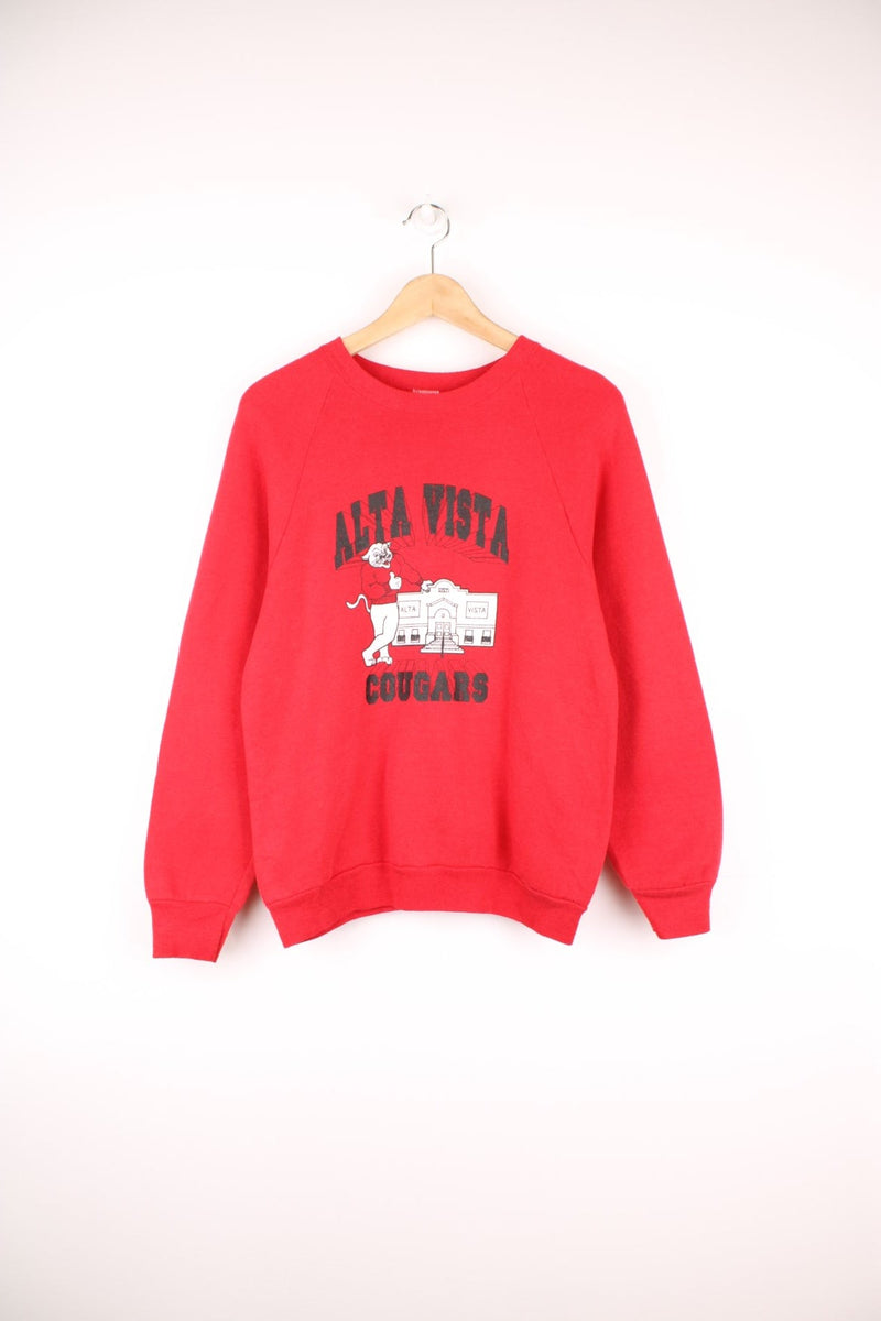 Vintage 'Alta Vista Cougars' graphic sweatshirt in red. 