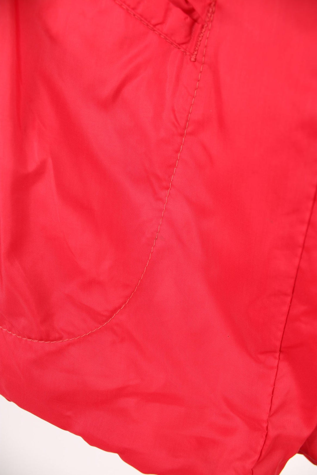 Vintage West Wind nylon coach jacket in red, features printed 'Amity Baseball' motif on the chest and back. 