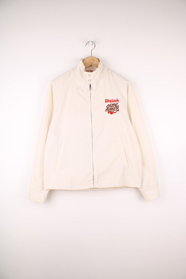 Vintage 80's/90's King Louie Pro Fit , bowling themed zip through coach jacket in cream. Features embroidered spell-out details on the chest.