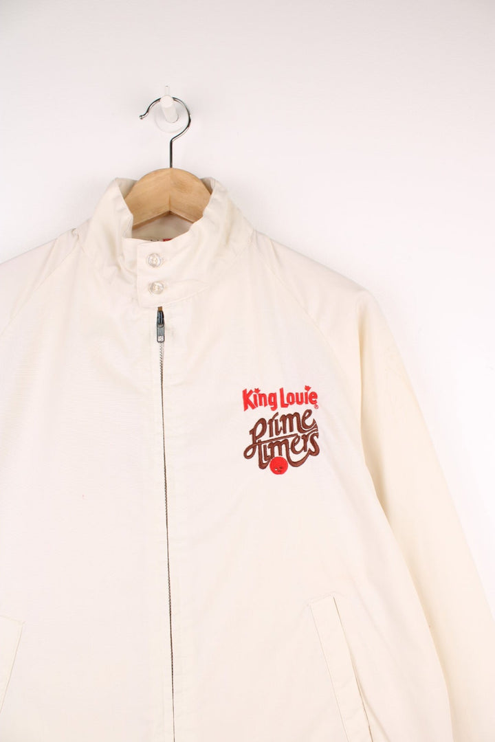 Vintage 80's/90's King Louie Pro Fit , bowling themed zip through coach jacket in cream. Features embroidered spell-out details on the chest.