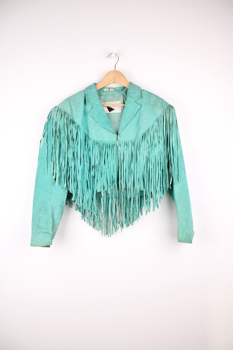 Cropped Western Fringe Jacket in a turquoise colourway, zip up with a camp collar and fringe tassels all around. 