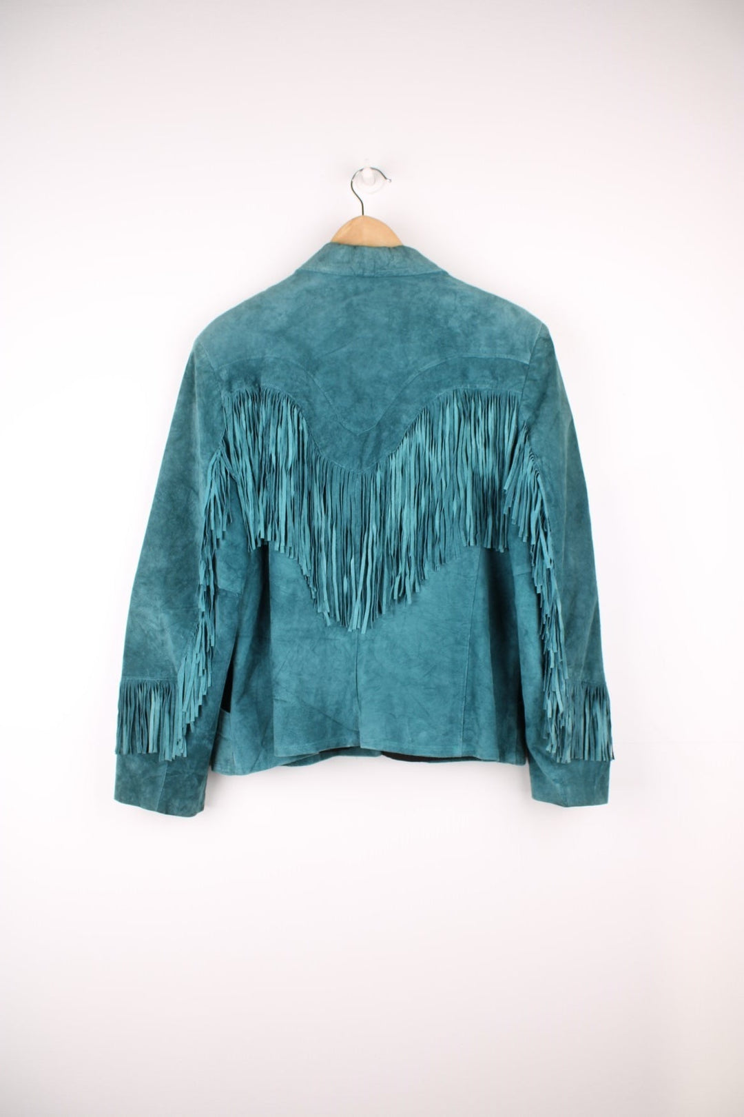 80's Pioneer Wear Western Fringe Jacket in a turquoise blue colourway, button up with a camp collar, has side pockets and tassels all around. 