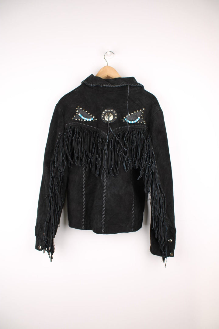 Sema Leathers Western Beaded Fringe Jacket in a black colourway, button up with side pockets, tassels throughout, and has beaded patterns on the front and back. 