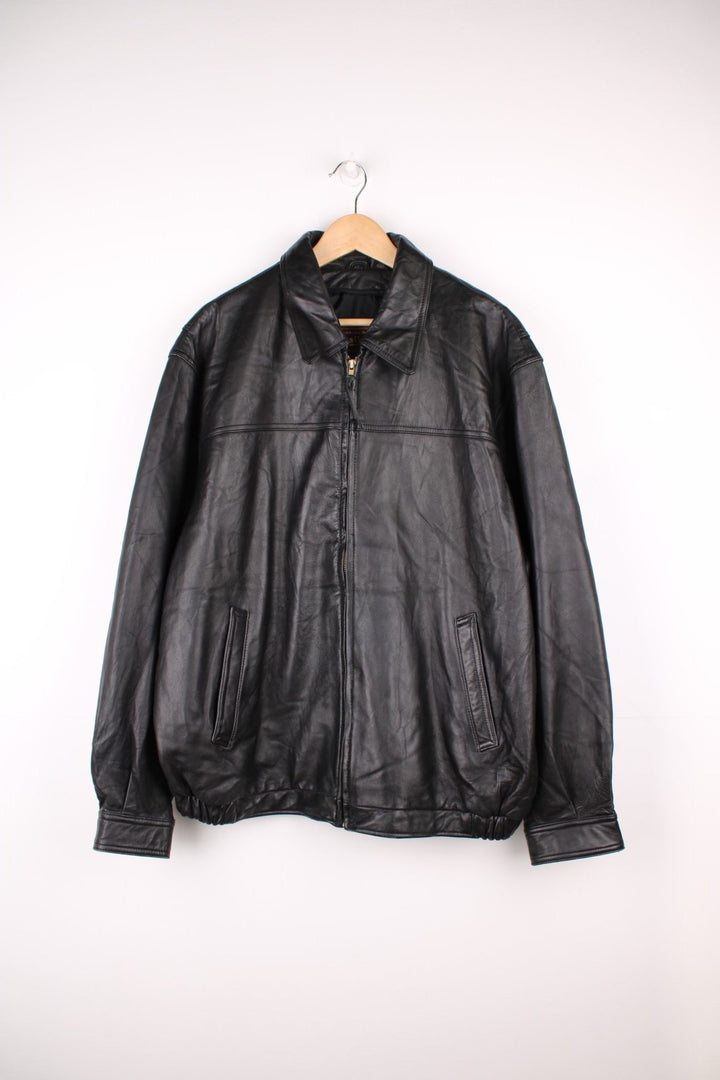 American Classics Leather Jacket in a black colourway, zip up with side pockets, and has a nylon lining.