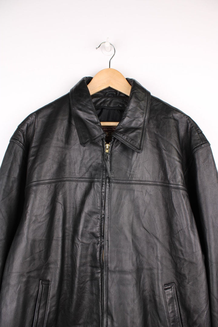 American Classics Leather Jacket in a black colourway, zip up with side pockets, and has a nylon lining.