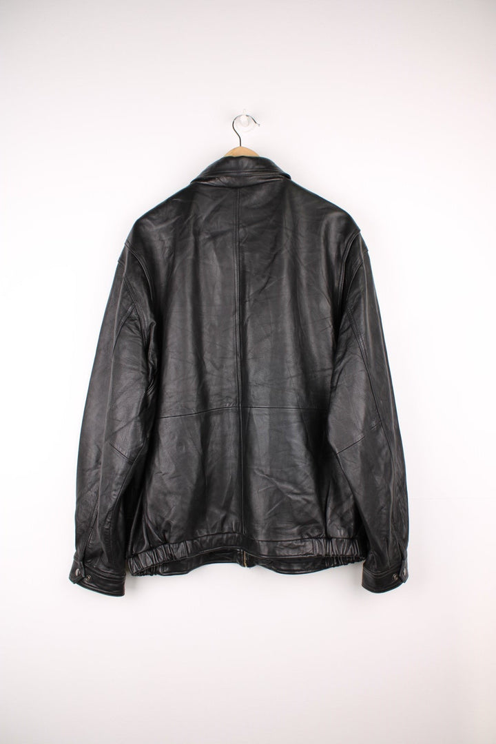 American Classics Leather Jacket in a black colourway, zip up with side pockets, and has a nylon lining.