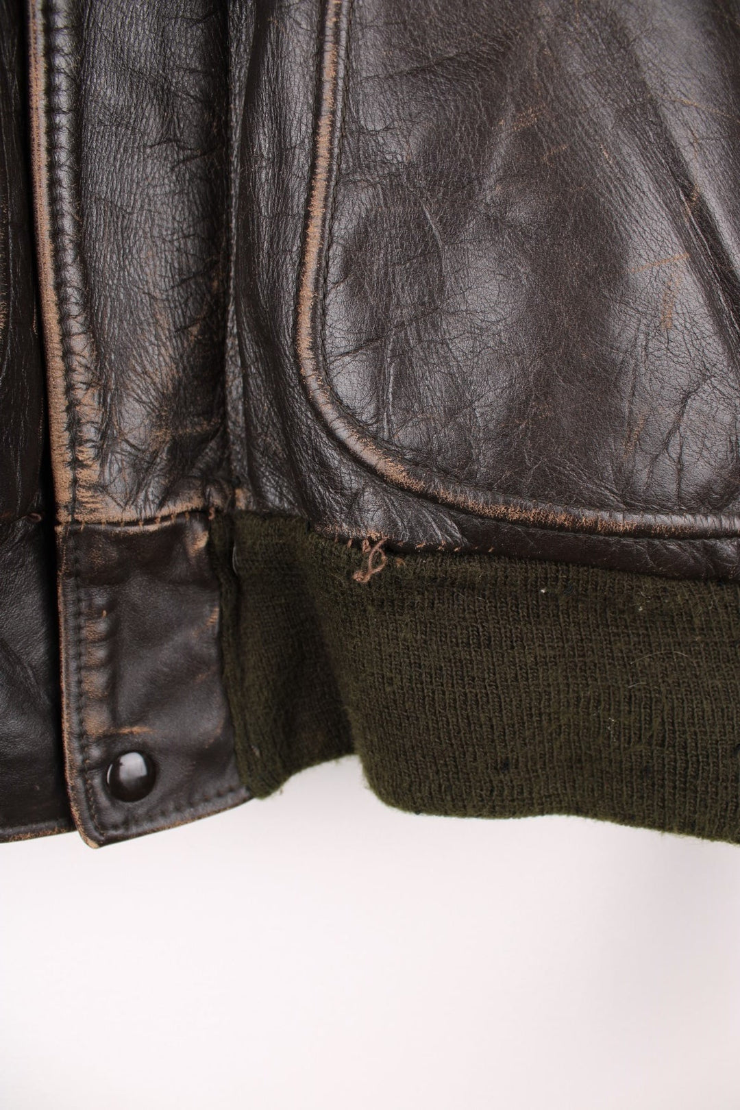 Vintage 60's Schott IS 674 Flight Jacket in a brown colourway with green cuffs, button up with side pockets and has a faux fur collar and lining.