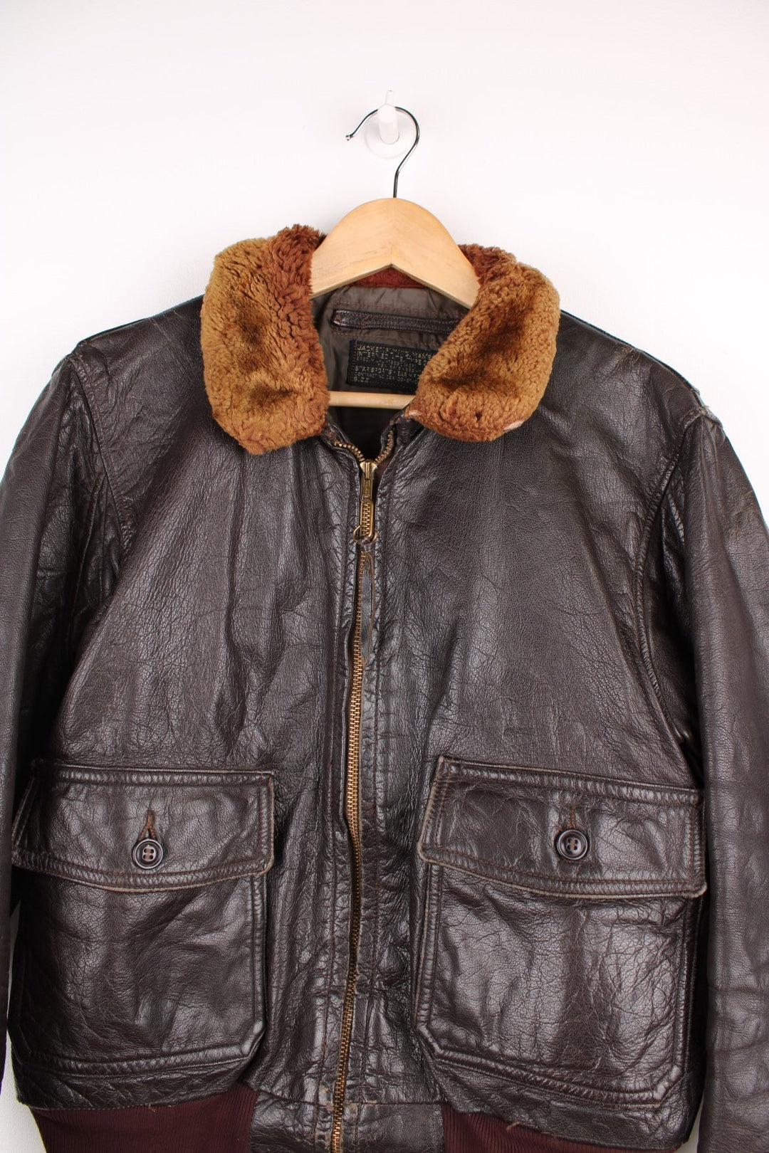 Vintage Leather Flight Aviator Jacket in a brown colourway, zip up with side pockets and has a faux fur collar.