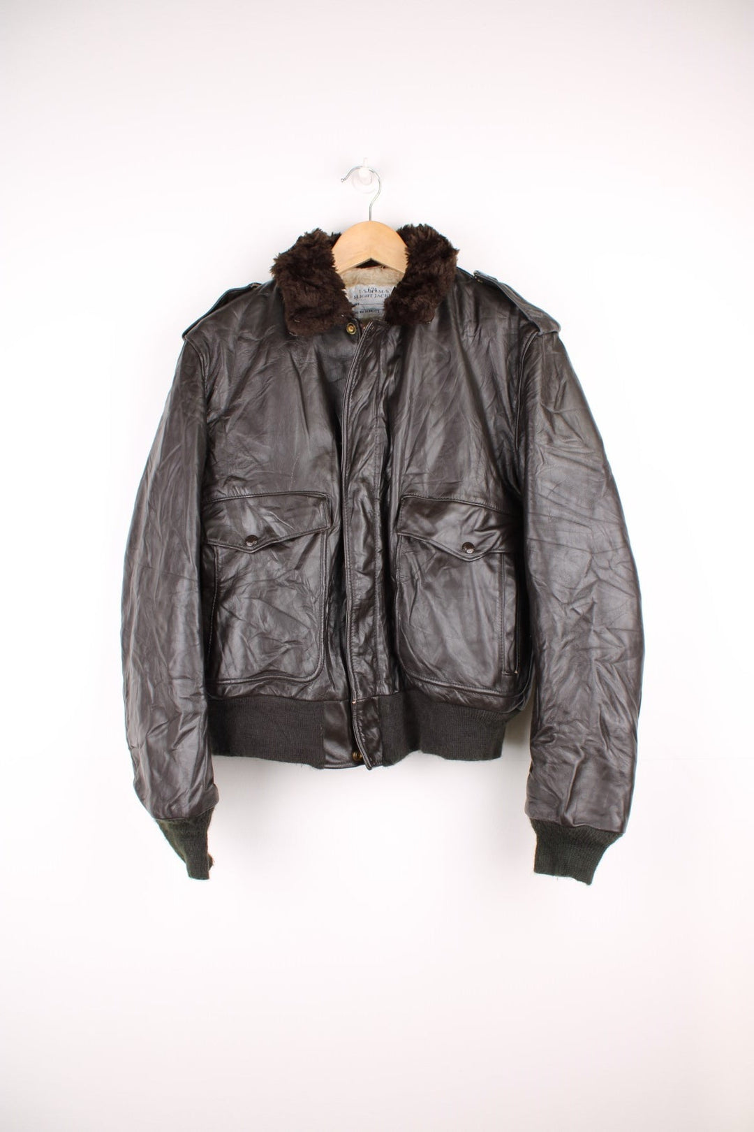 Schott Leather Flight Jacket in a brown colourway with a faux fur collar, zip up with side pockets and has a faux fur lining. 