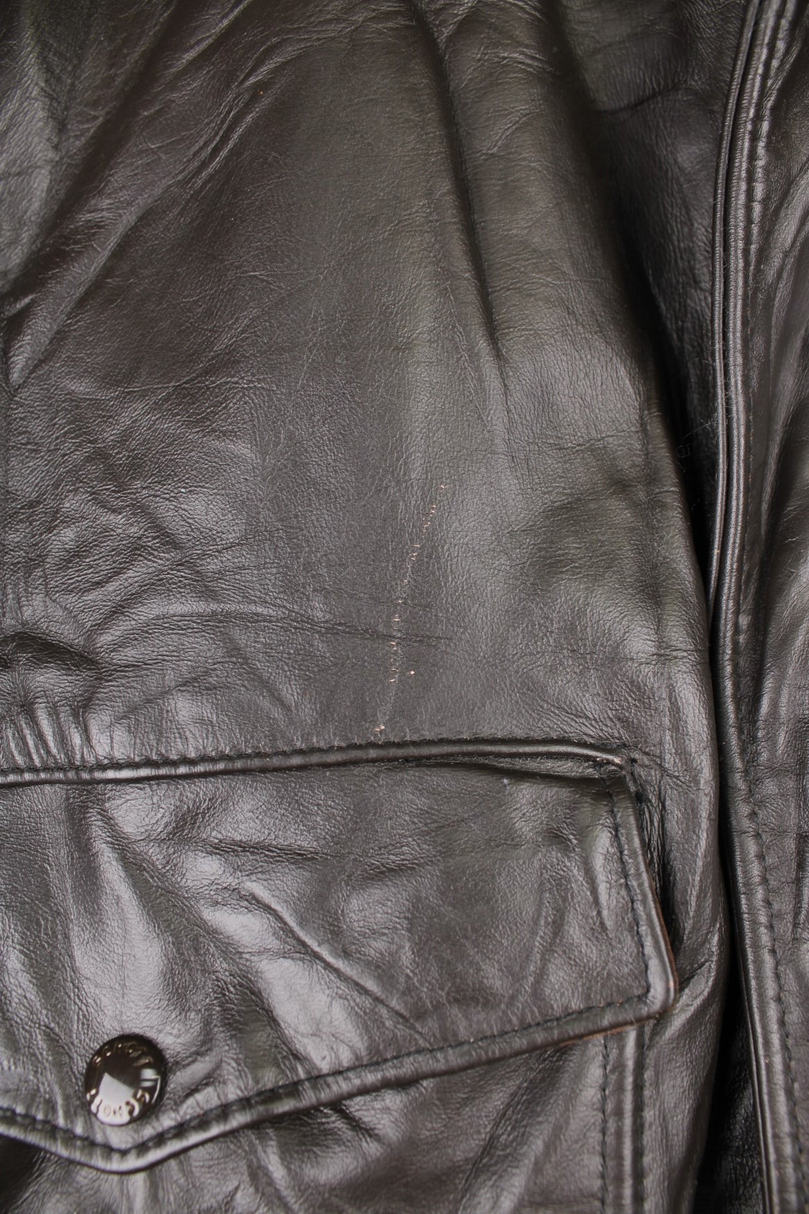 Schott Leather Flight Jacket in a brown colourway with a faux fur collar, zip up with side pockets and has a faux fur lining. 