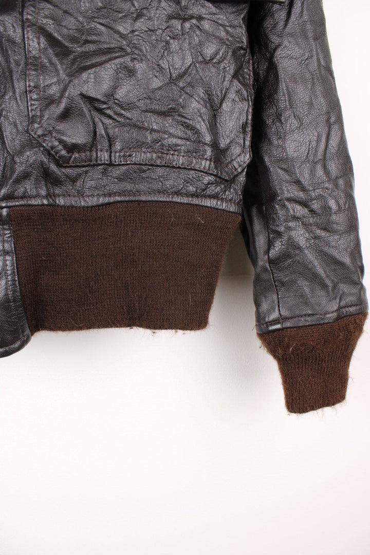 Vintage Avirex G-1 Flight Jacket in a brown colourway with a faux fur collar, zip up and has pockets. 