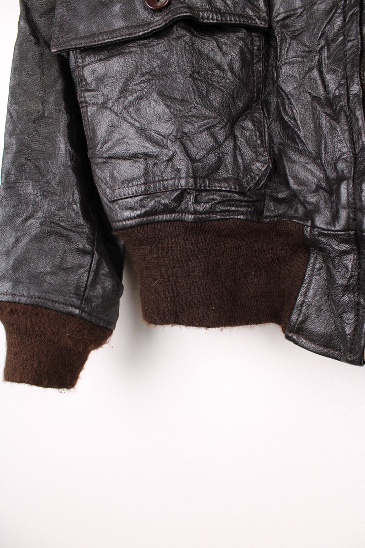 Vintage Avirex G-1 Flight Jacket in a brown colourway with a faux fur collar, zip up and has pockets. 