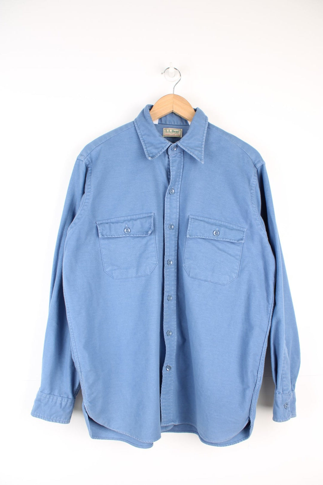 Vintage L.L. Bean Shirt in a plain blue colourway, button up and has double chest pockets on the front. 