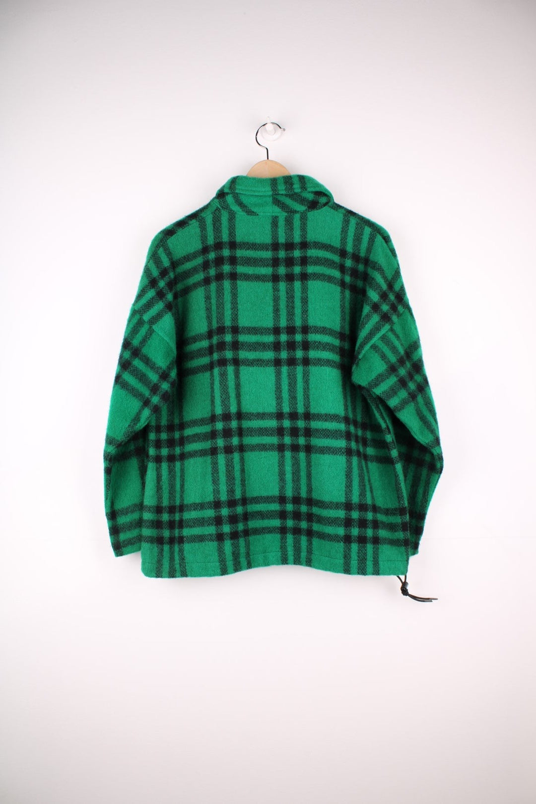 L.L. Bean Plaid Pullover Sweater in a green and black colourway, half button up with a collar, and has a adjustable hem. 