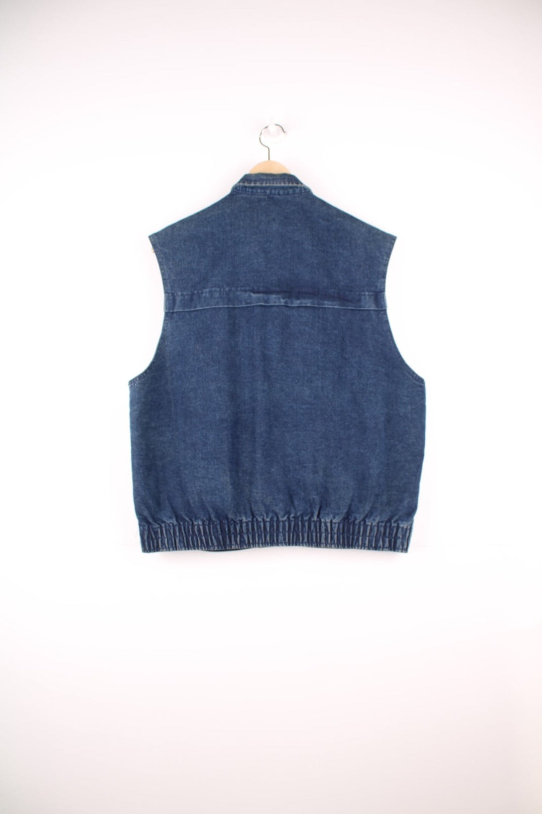 Ms. Lee collared blue denim vest with button closure and double side pockets. 