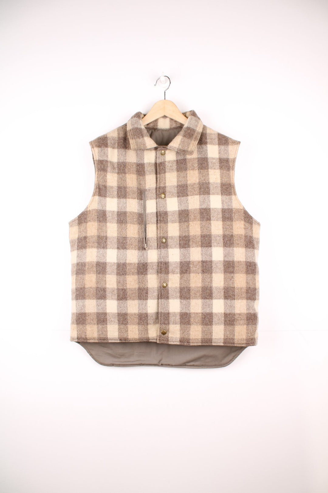 Woolrich tan and cream collared check gilet with a breast pocket and snap closure. 