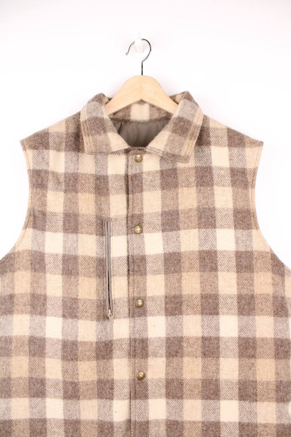 Woolrich tan and cream collared check gilet with a breast pocket and snap closure. 