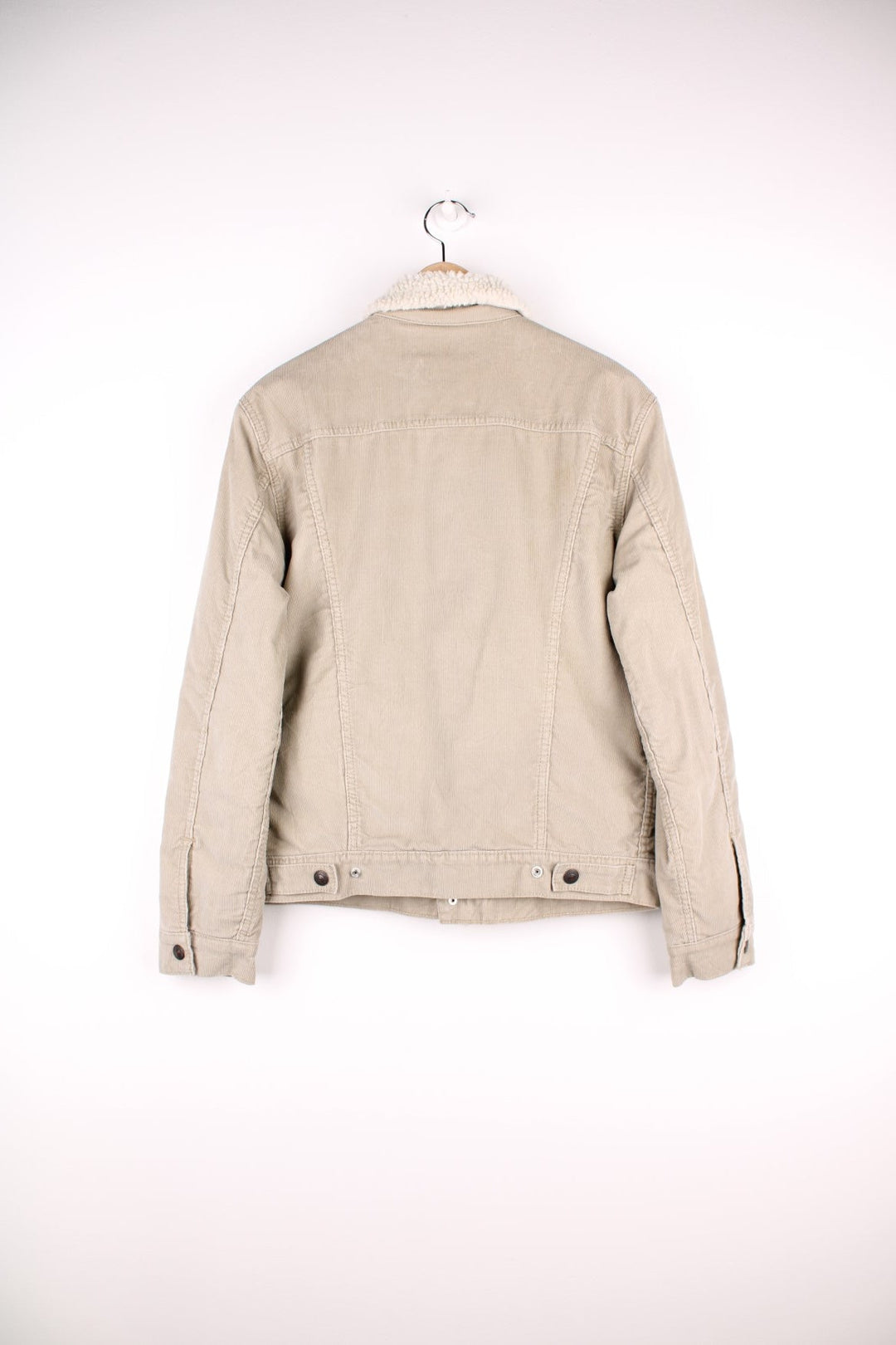 Levi's Corduroy Sherpa Jacket in a tanned colourway with a white sherpa lining, button up with multiple pockets, and has the logo embroidered on the front.