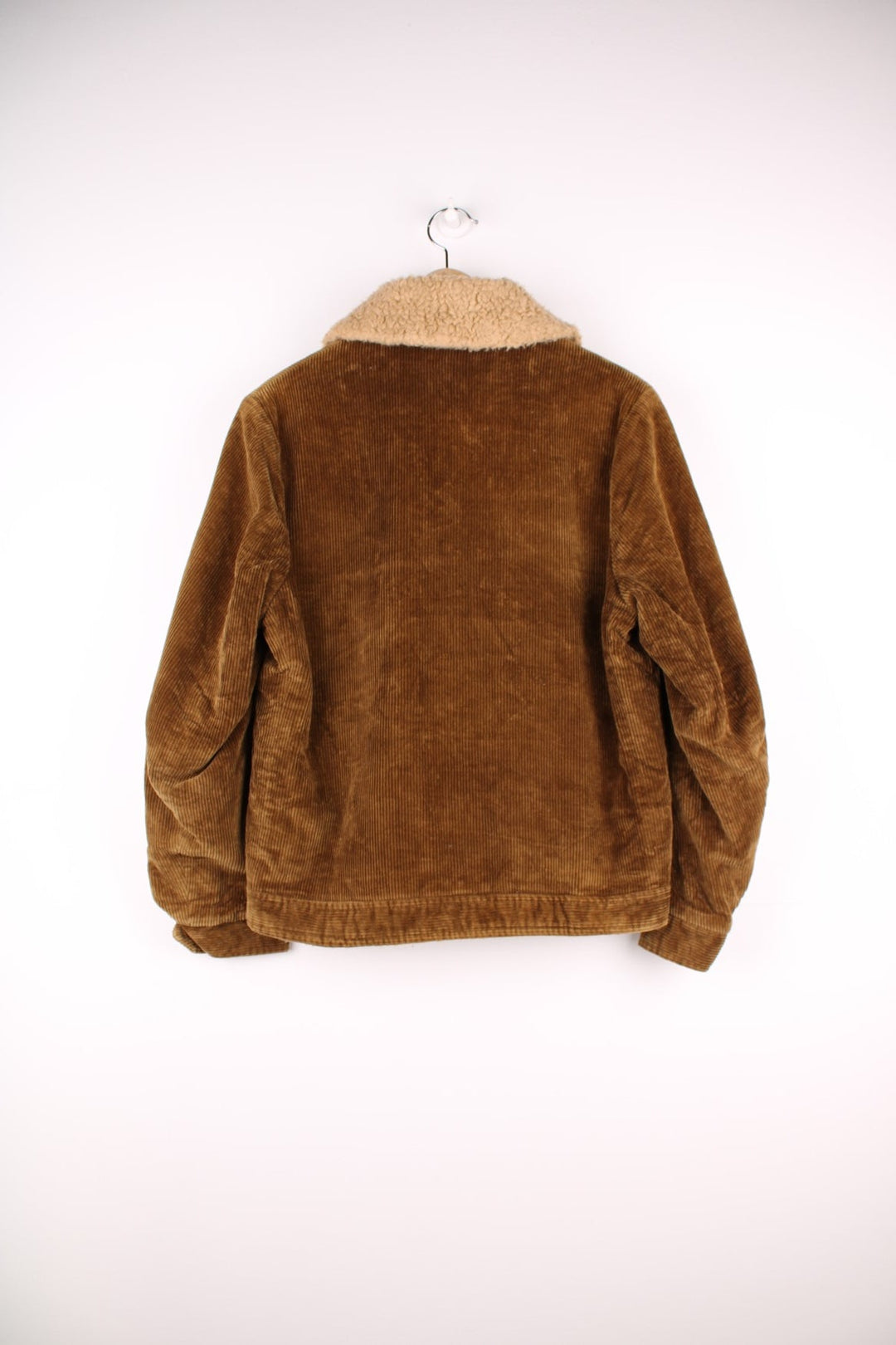 Vintage 80's Corduroy Sherpa Jacket in a brown colourway, zip up with multiple pockets, dagger collar, and has a sherpa lining.