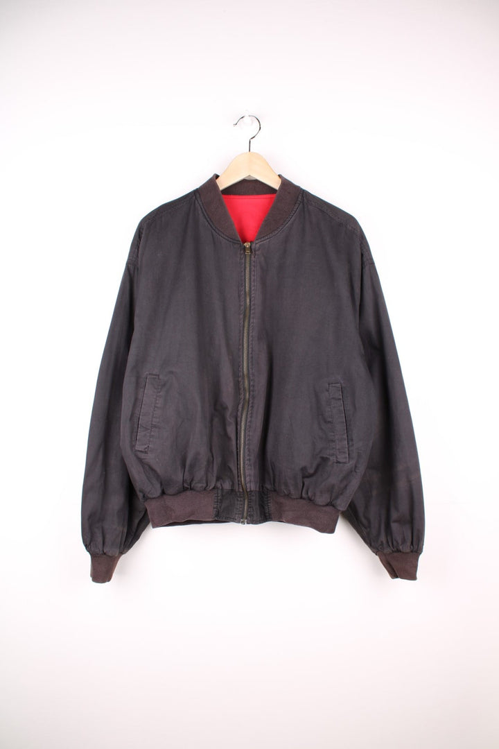 90s Marlboro bomber jacket with pockets, an embroidered spelllout on the back and zip closure. 