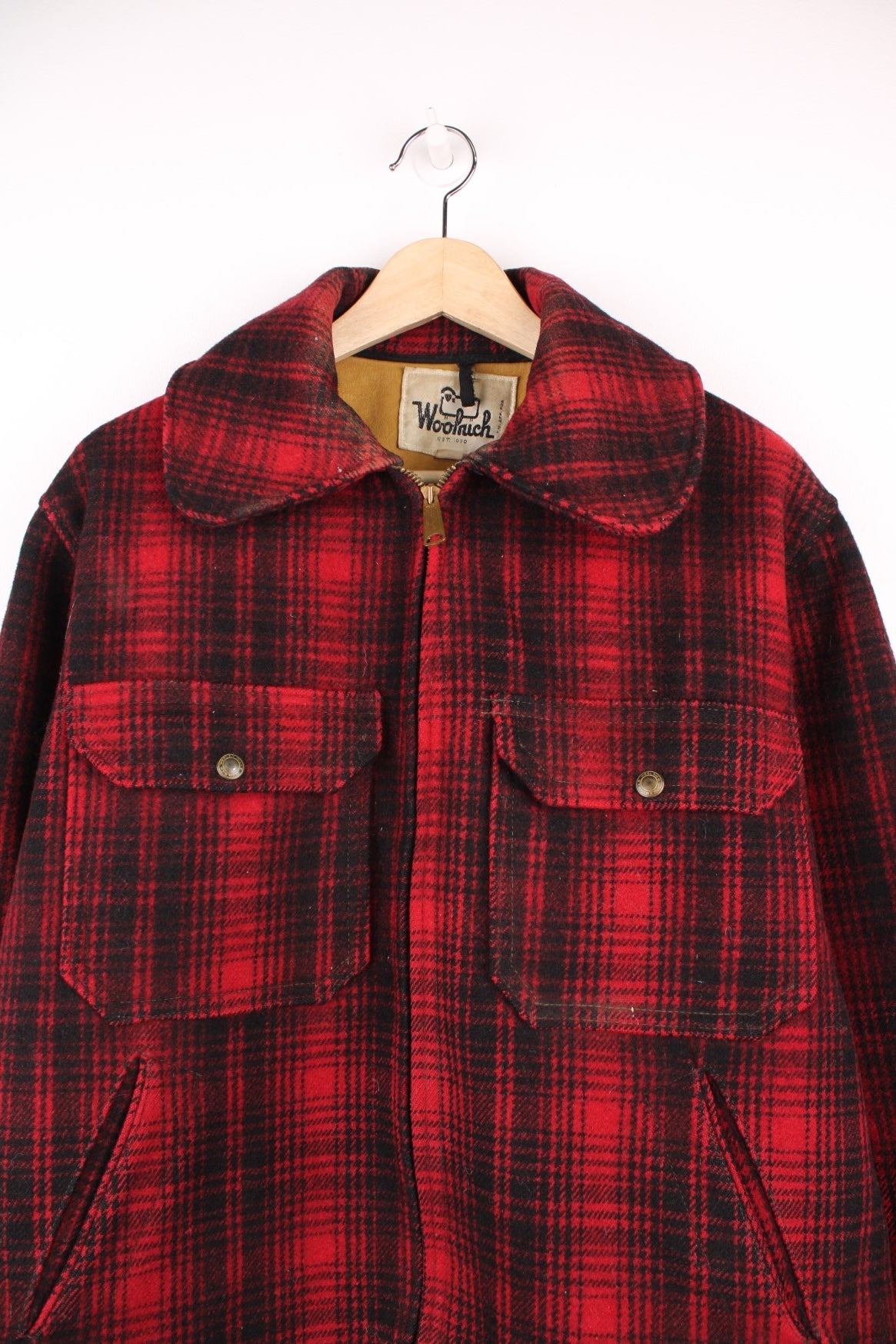 Woolrich red and black check CPO jacket with zip closure and four pockets. 