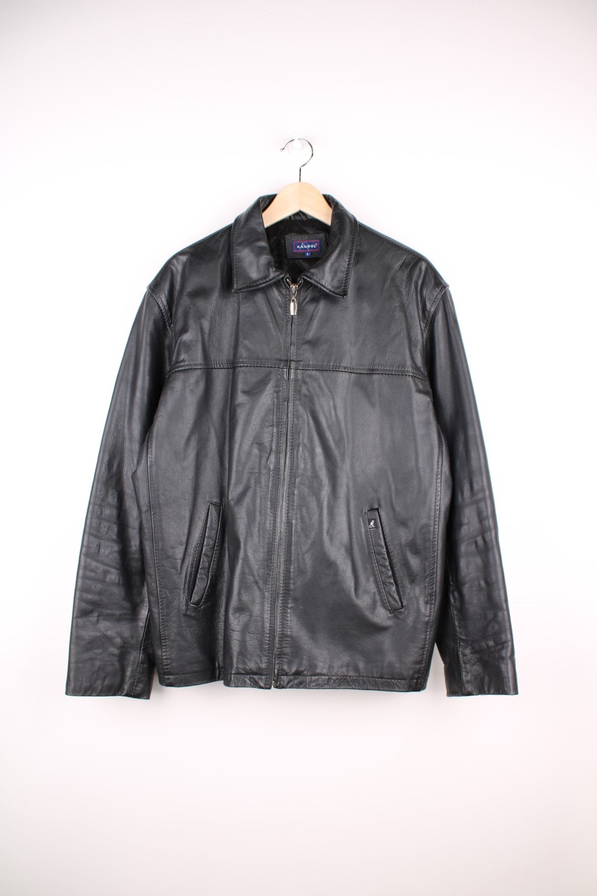 Kangol collared real leather jacket with zip closure and two pockets. 