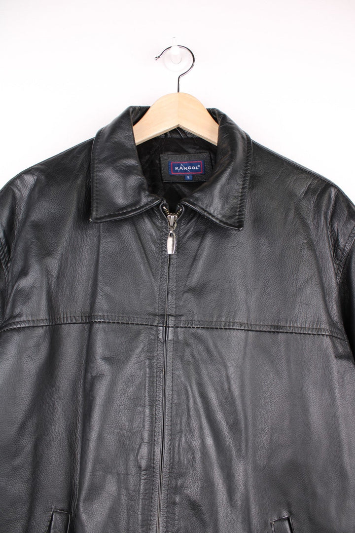 Kangol collared real leather jacket with zip closure and two pockets. 