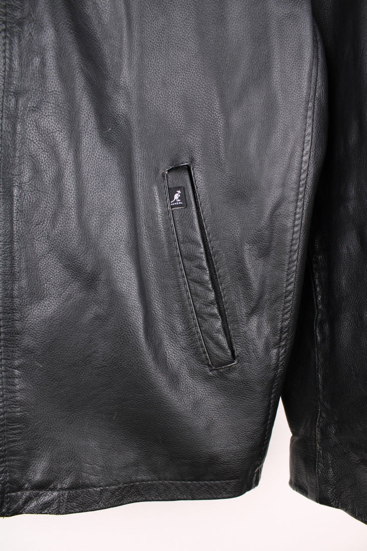 Kangol collared real leather jacket with zip closure and two pockets. 