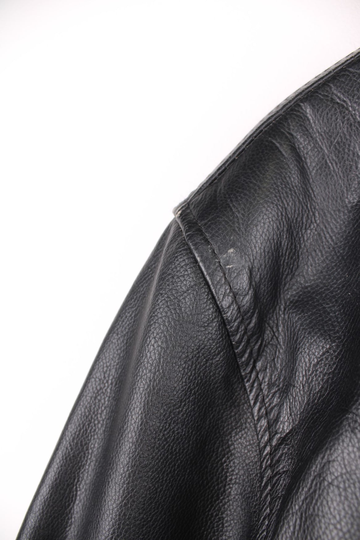 Kangol collared real leather jacket with zip closure and two pockets. 