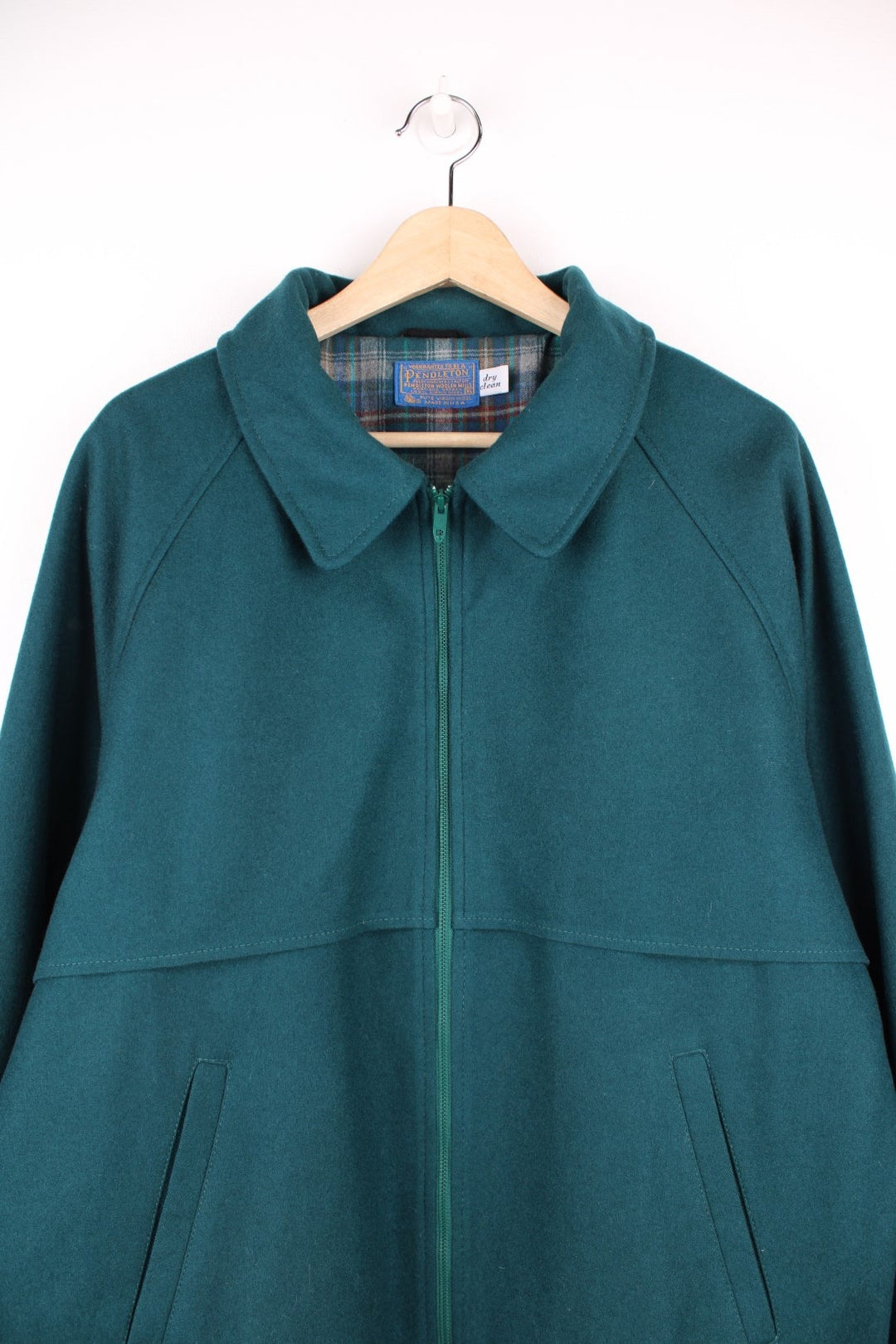 Pendleton green CPO jacket with two side pockets and zip closure. 