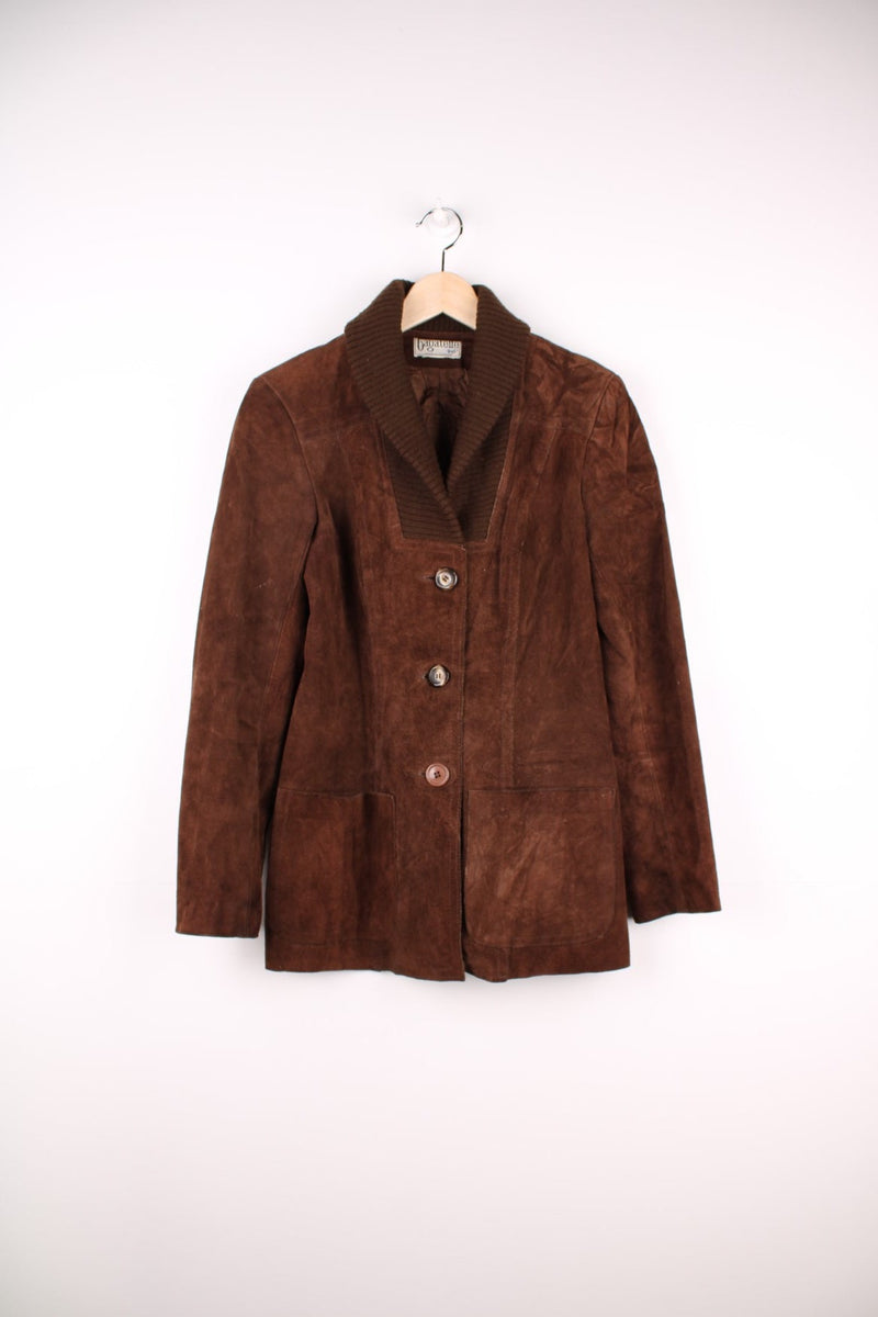 Vintage 80's Bagatelle Leather Coat in a brown colourway, buttons up and has double pockets on the front. 