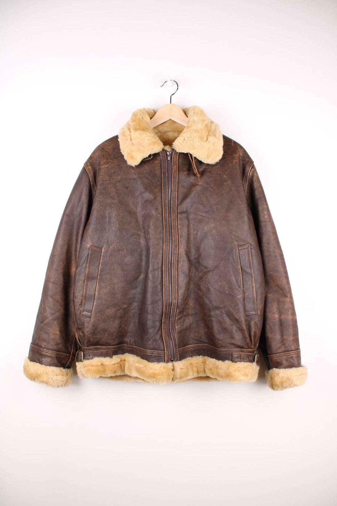 Vintage Playboy Leather Shearling Flight Jacket in a brown colourway with a cream lining, zips up and has side pockets. 