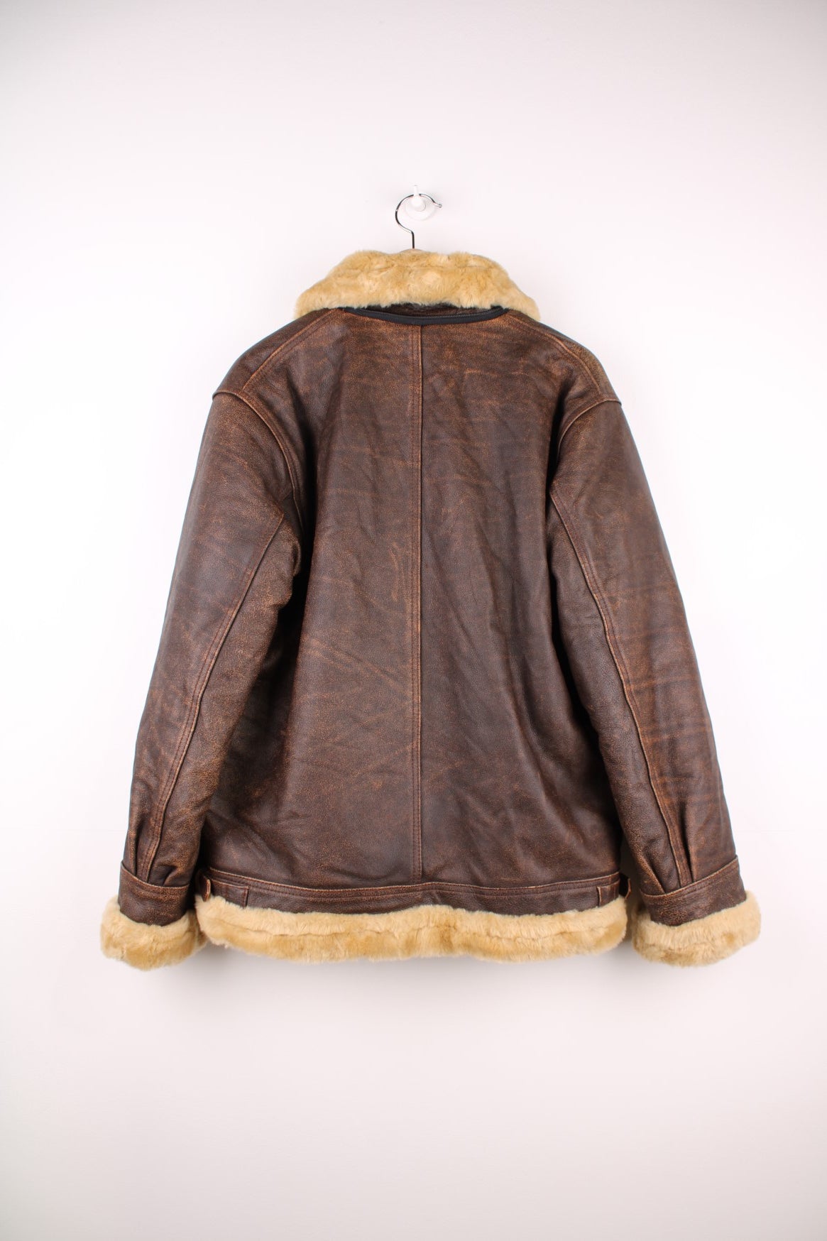 Vintage Playboy Leather Shearling Flight Jacket in a brown colourway with a cream lining, zips up and has side pockets. 