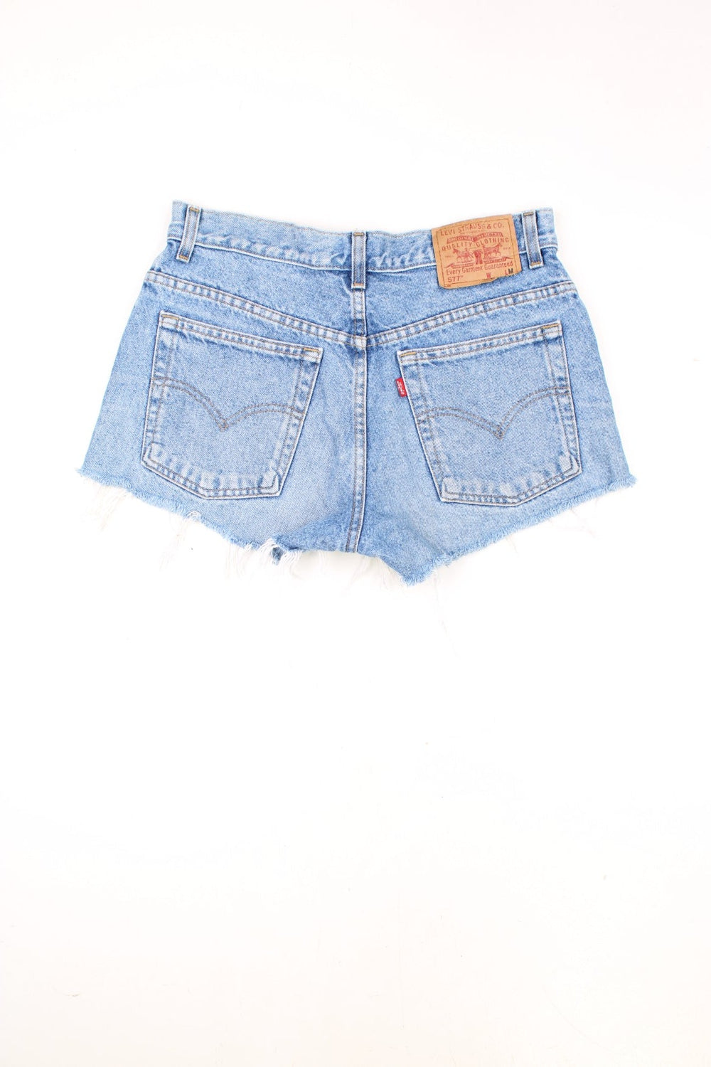 Levi's light blue 501 cutoff shorts with front and back pockets, distressed detailing and Levi's branded hardware.