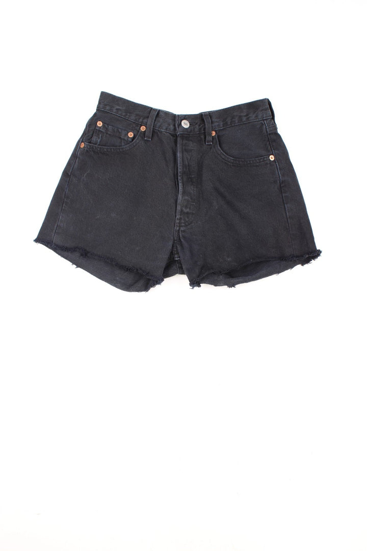 Levi's black 501 cutoff shorts with front and back pockets, distressed detailing and Levi's branded hardware.