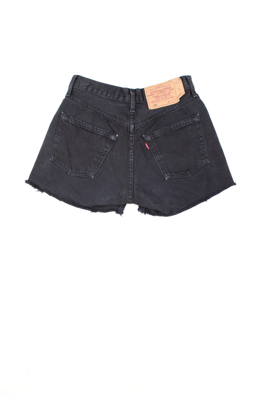 Levi's black 501 cutoff shorts with front and back pockets, distressed detailing and Levi's branded hardware.