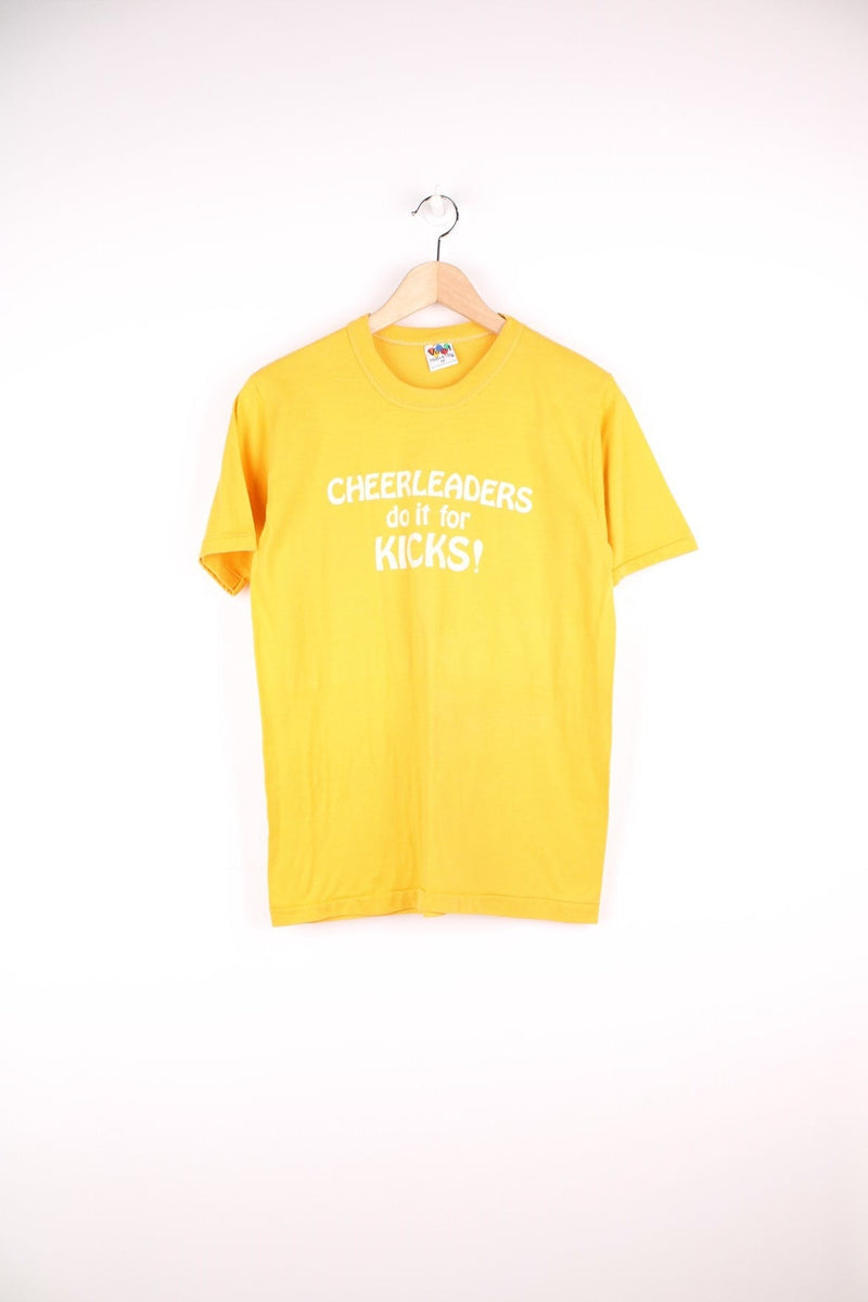 Vintage yellow 'CHEERLEADERS do it for KICKS!' spellout tee